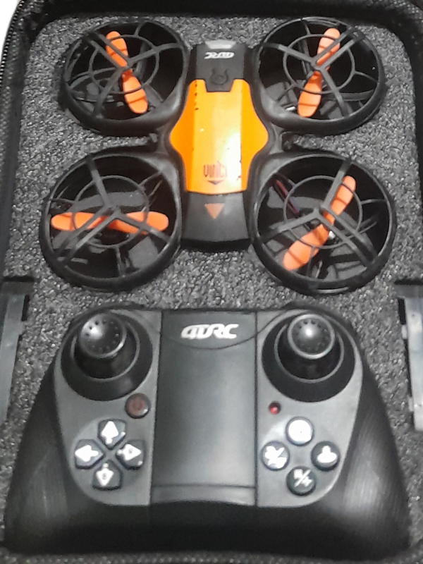 4DRC V8 mini RC drone in black and orange color scheme with protective propeller guards