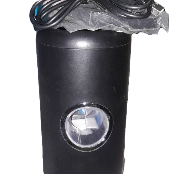 Electric UVC toothpaste dispenser with infrared induction and ultraviolet disinfection technology.